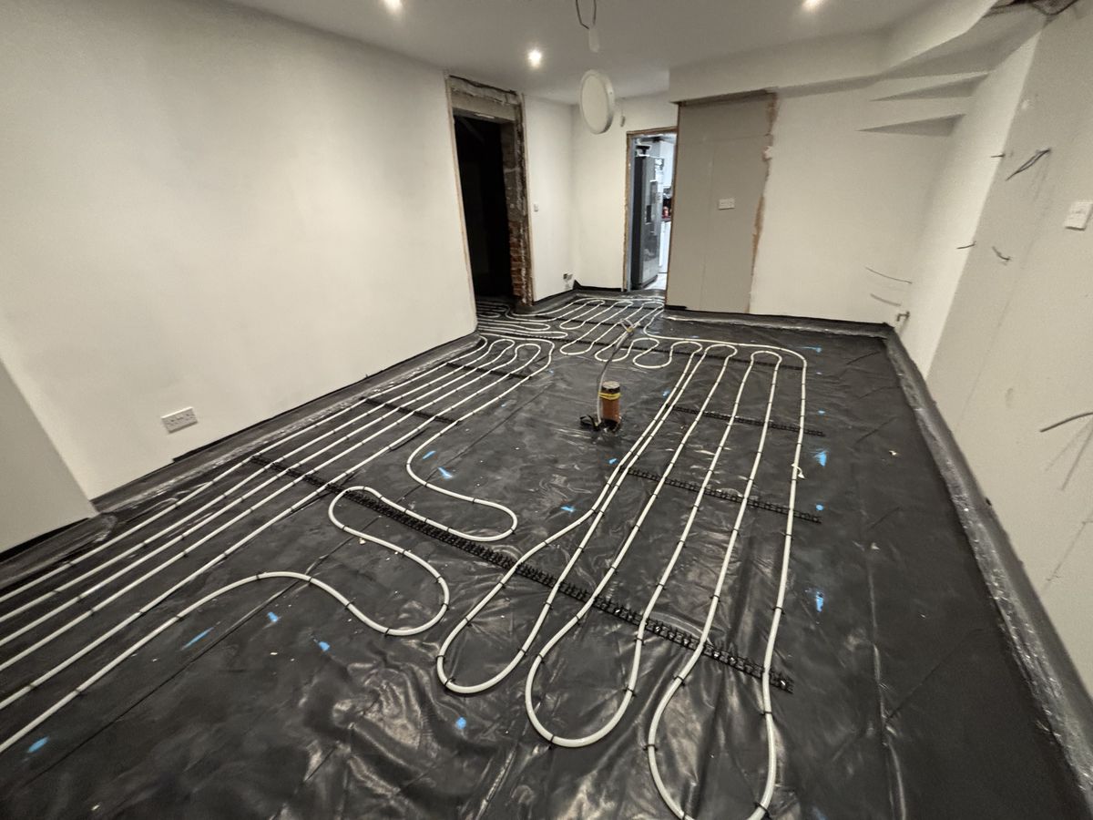 Underfloor heating pipework laid before screed