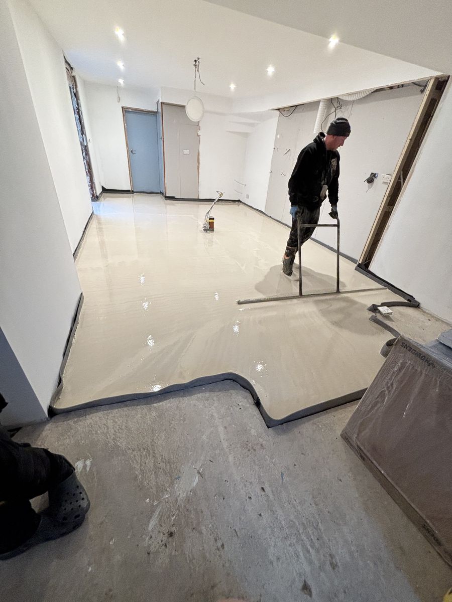 New fibre-reinforced concrete floor poured in-house over the underfloor heating