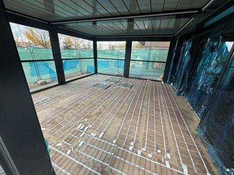 Underfloor heating pipework laid before tiling