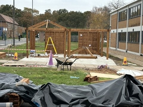 Bespoke timber shelter under construction on the campus