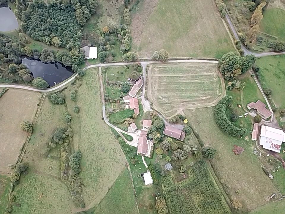 Aerial view of the converted barn estate in rural France