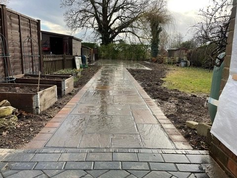 Finished block-paved access path and landscaping